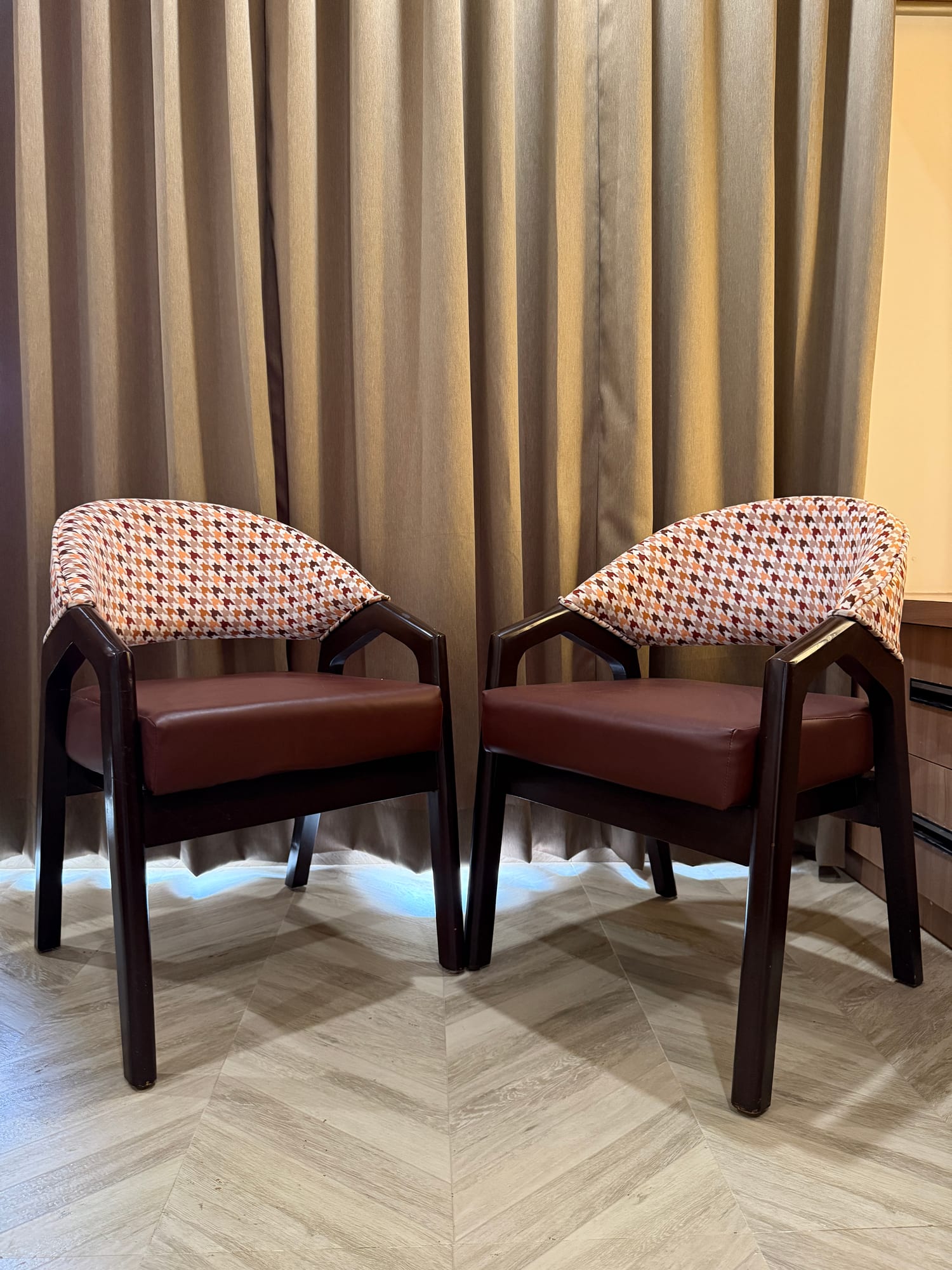 Designer lounge chairs in a Cosmo guest room