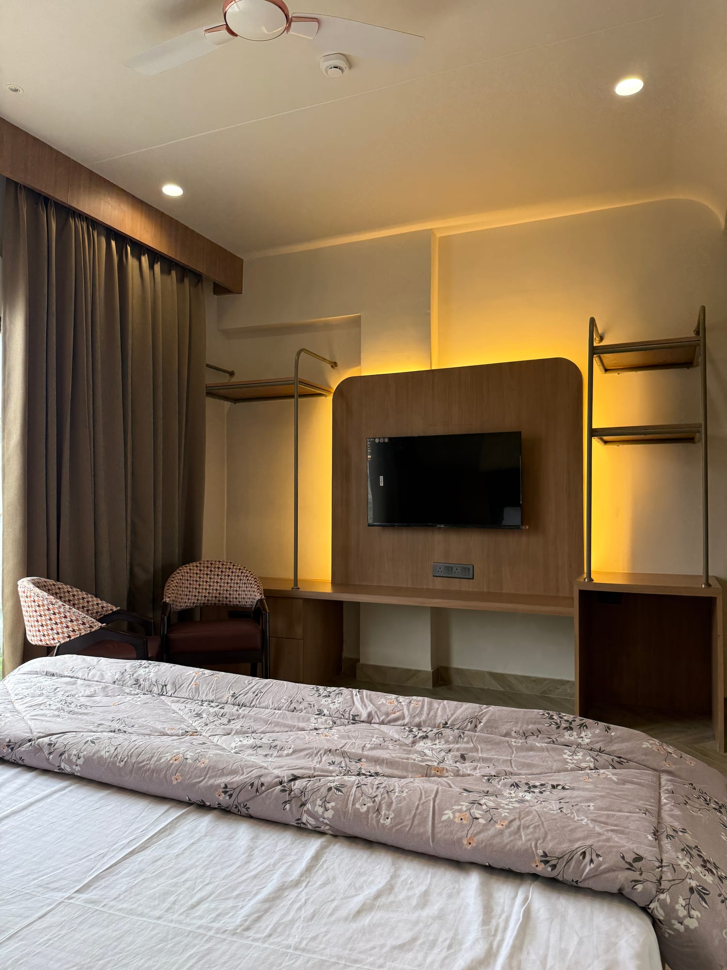 Smart TV and desk wall in a Cosmo room