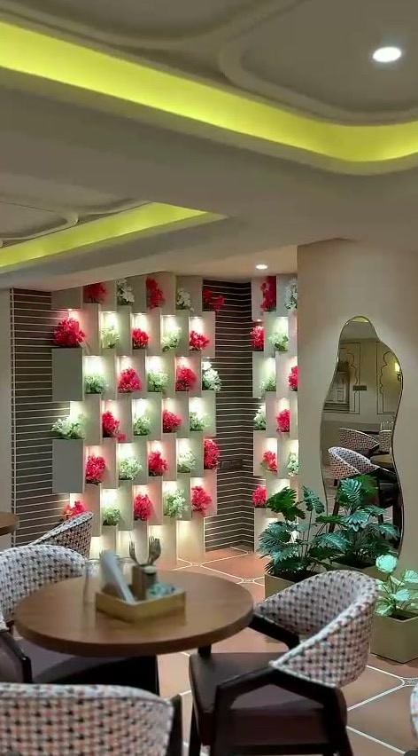The Cosmo dining room with illuminated flower wall