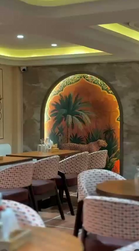 The Cosmo dining hall with mural arch